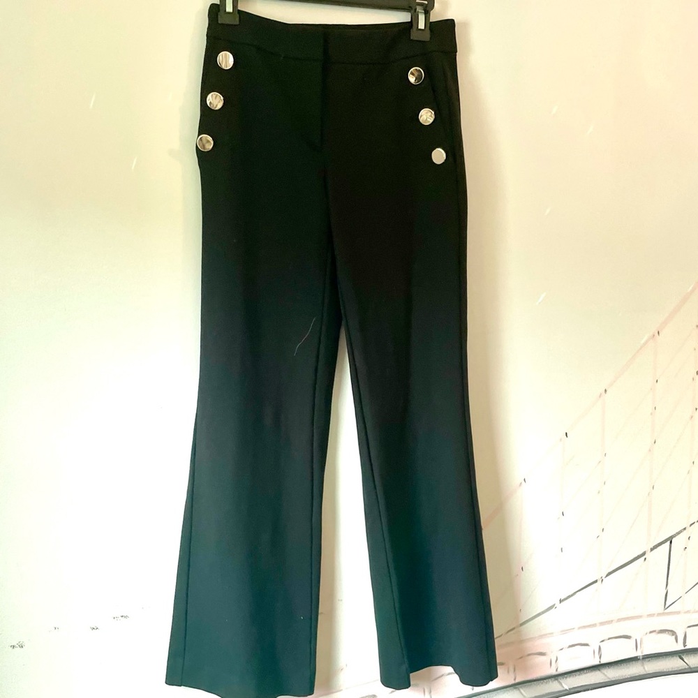 Wide leg black dress pants with large, button-front detail